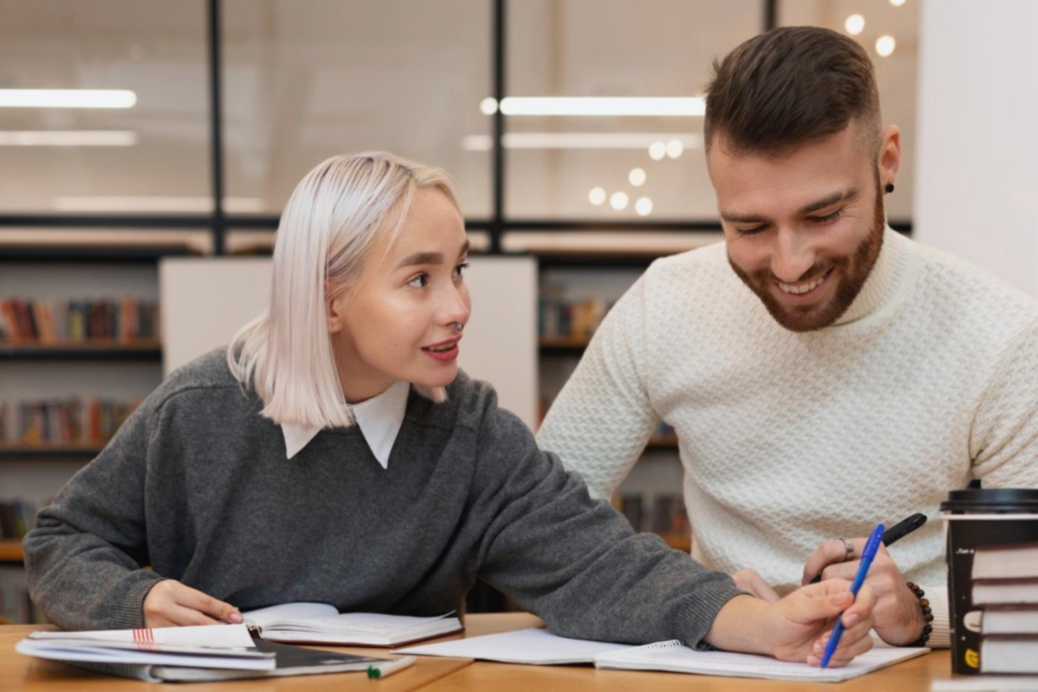 Business professionals practicing presentation skills with financial documents and charts